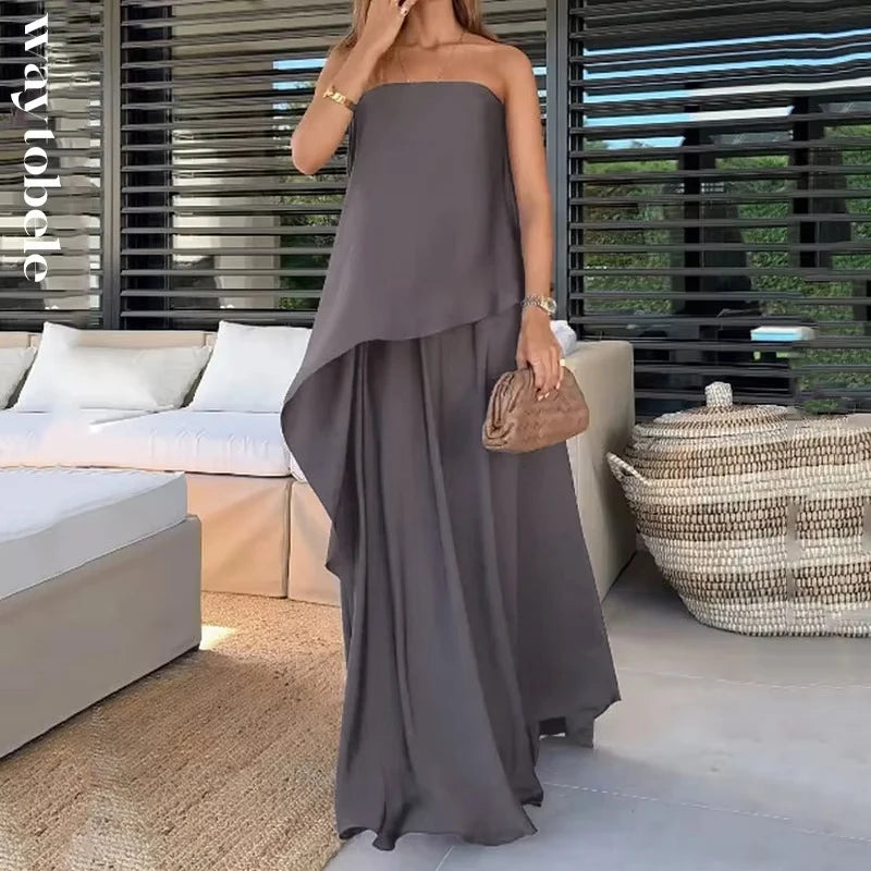 Conjunto Feminino Elegante Calandra – Tom Sólido com Top Tomara-que-Caia Assimétrico e Saia Longa Solta